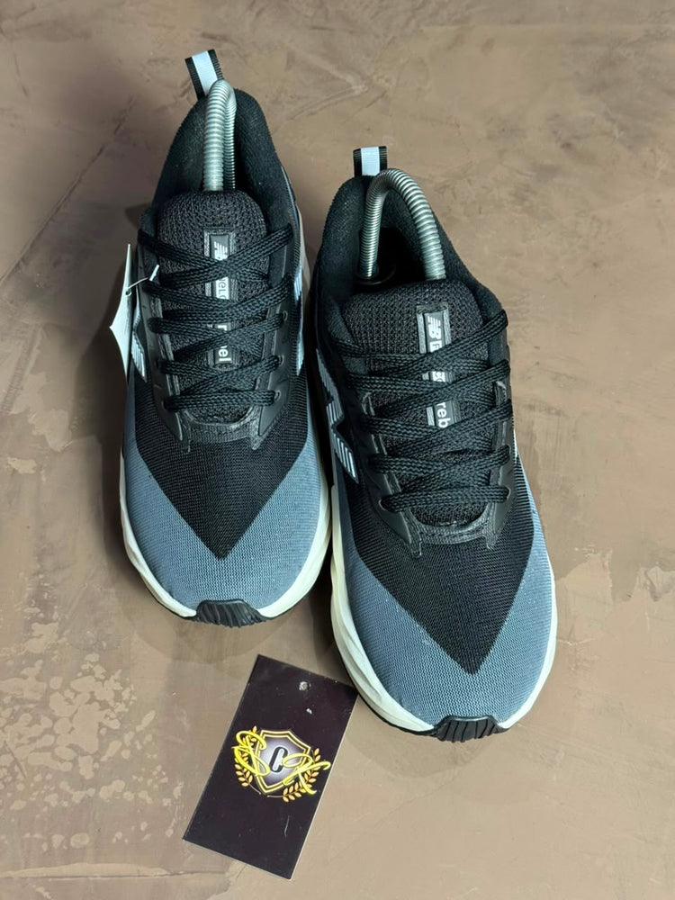 TENIS NB REBEL